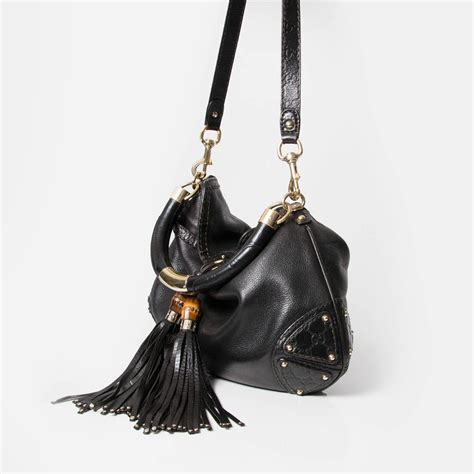 gucci hobo black au|Gucci hobo bag with tassels.